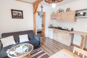 Фото номера Апартаменты с 1 спальней Апартаменты Apartamenty Migaczówka г. Тылич 7