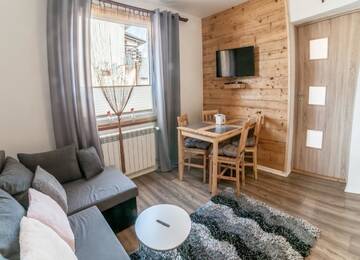 Фото номера Апартаменты с 1 спальней Апартаменты Apartamenty Migaczówka г. Тылич 2